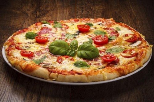 Que herbes sont utilisées dans Aromates pour Pizza?